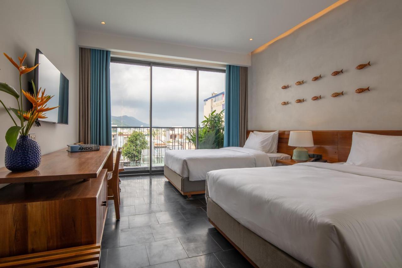 Le Mint Hotel Куинён Экстерьер фото
