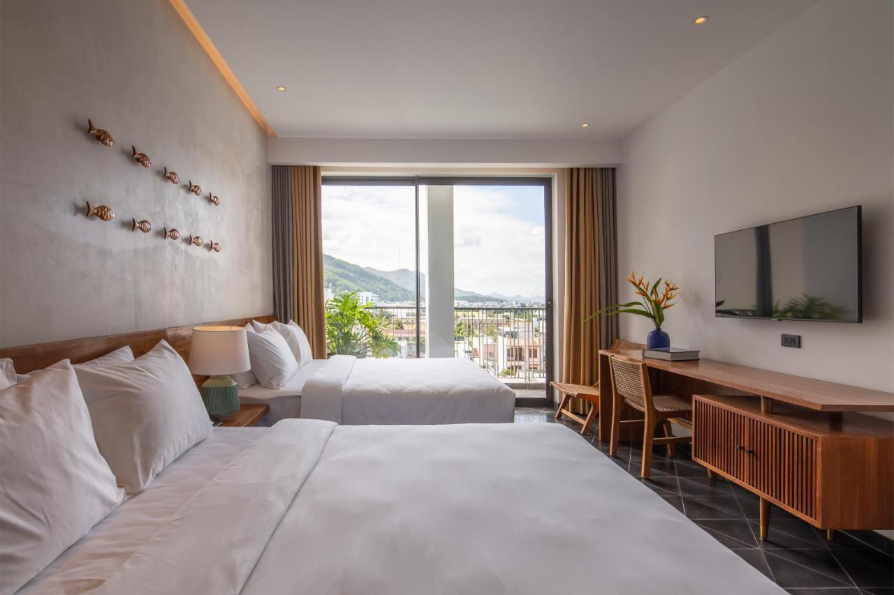 Le Mint Hotel Куинён Экстерьер фото