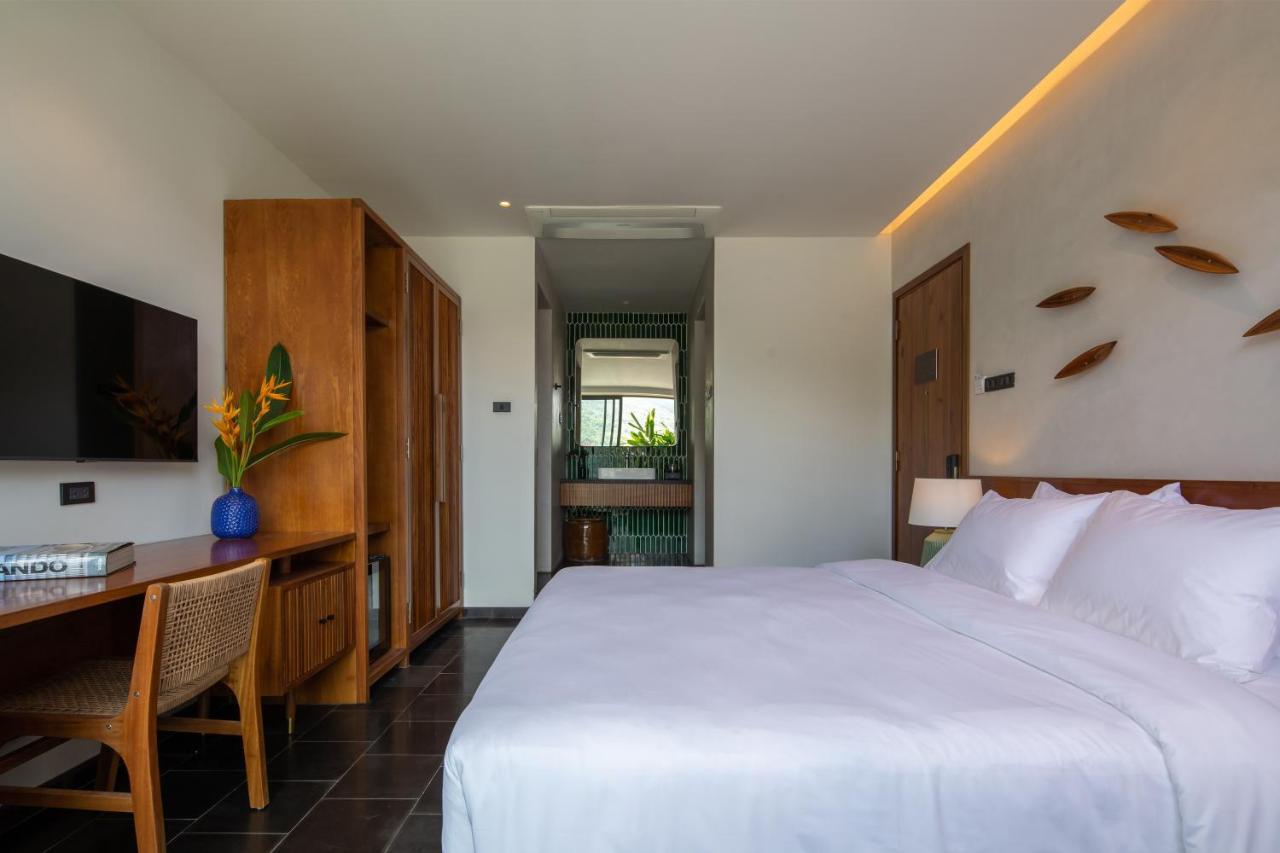 Le Mint Hotel Куинён Экстерьер фото